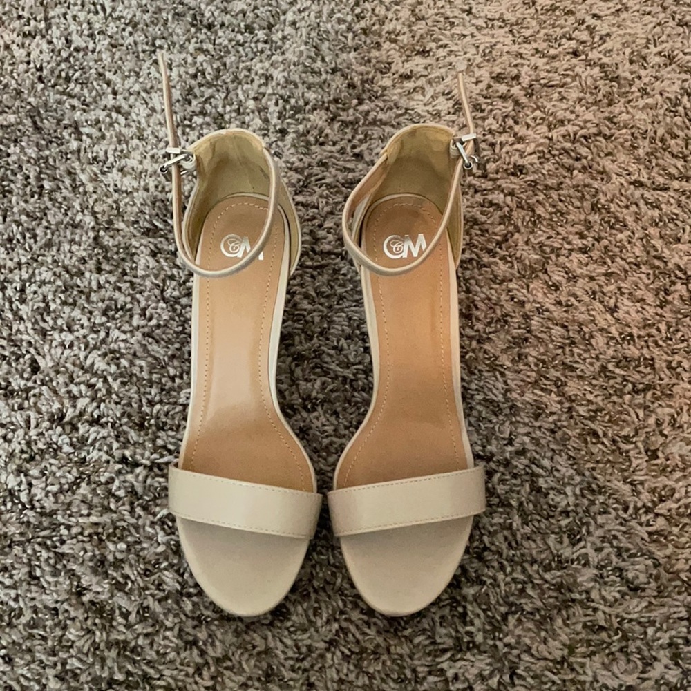 Nude heels from Shoe Department. Only worn once. Great condition.